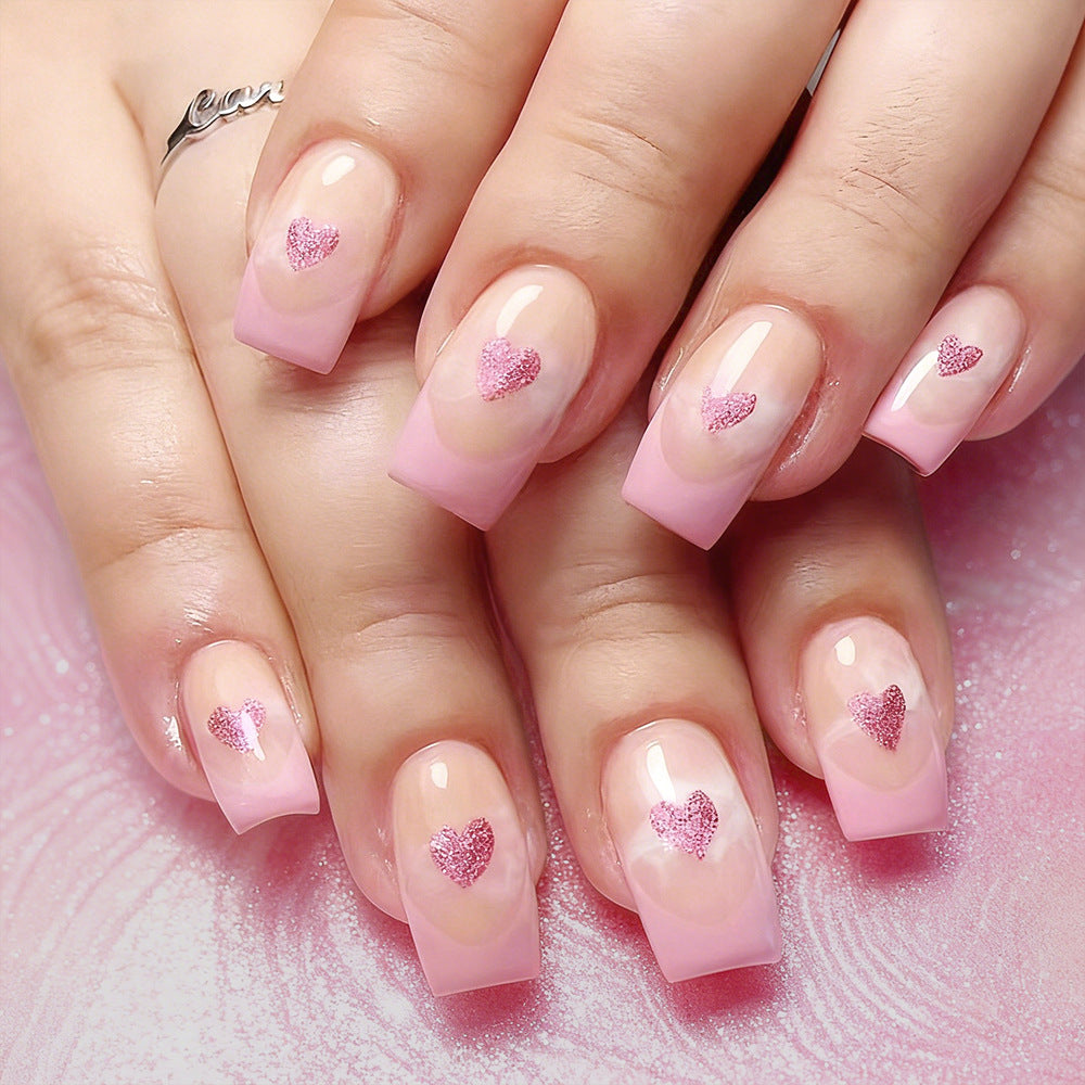 Heart-Embellished French Tip Acrylic Nails Stornfield