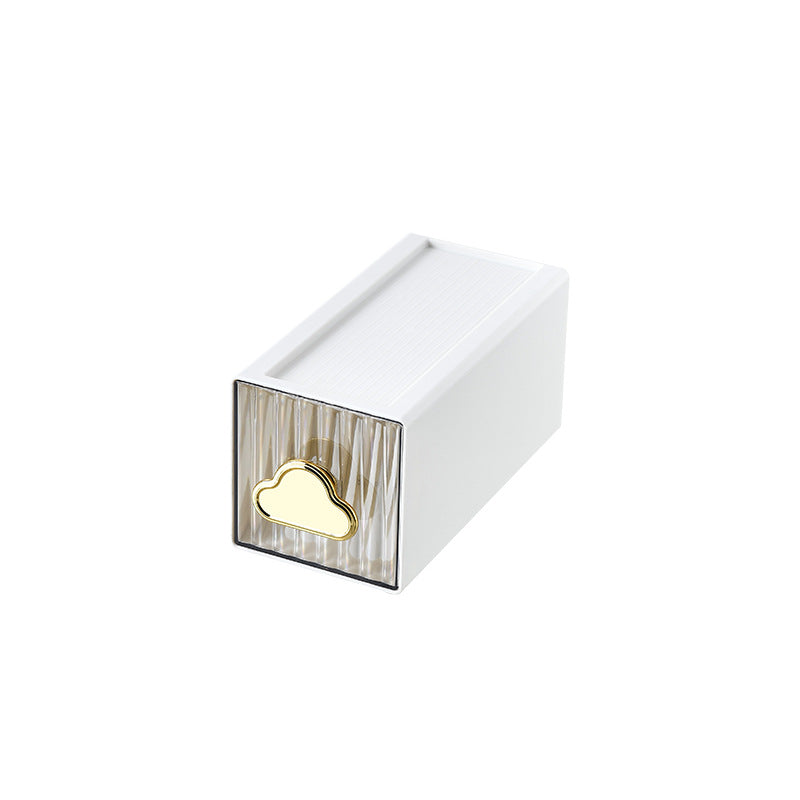 Small jewelry storage box with ribbed front and decorative cloud handle