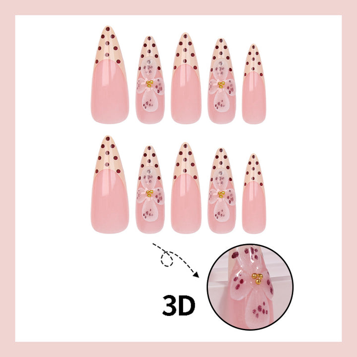 Art nail set with elegant flower and dot designs Stornfield