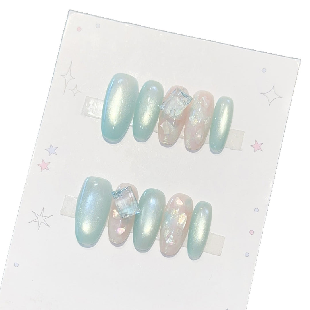 Glamorous artificial nails with shimmering accents Stornfield