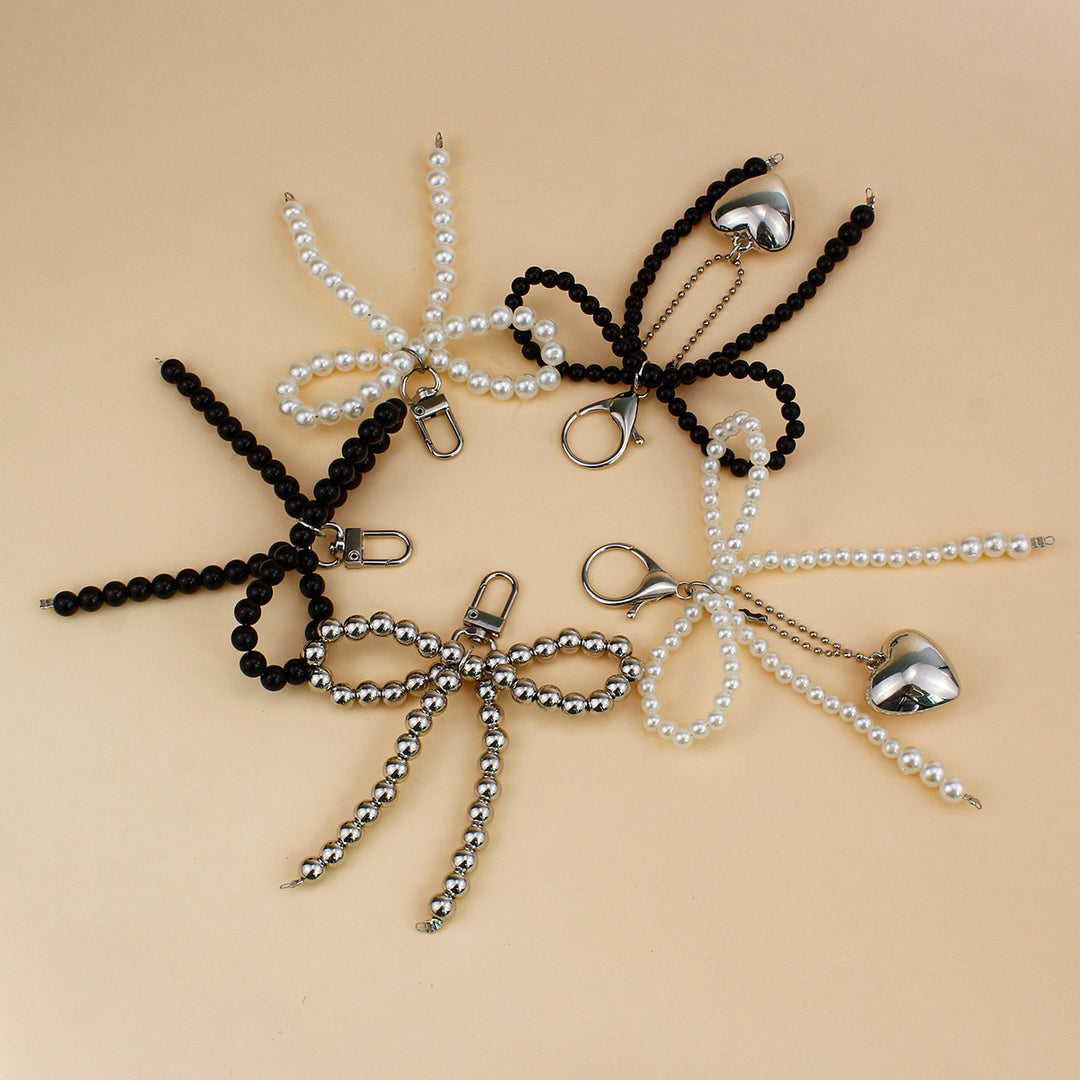 Elegant Pearl Bow Brooch Stornfield