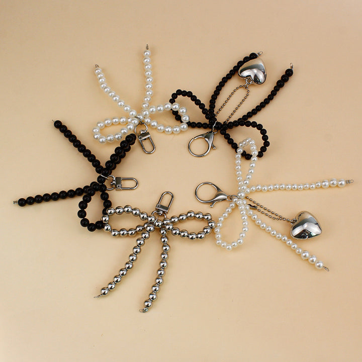 Elegant Pearl Bow Brooch Stornfield