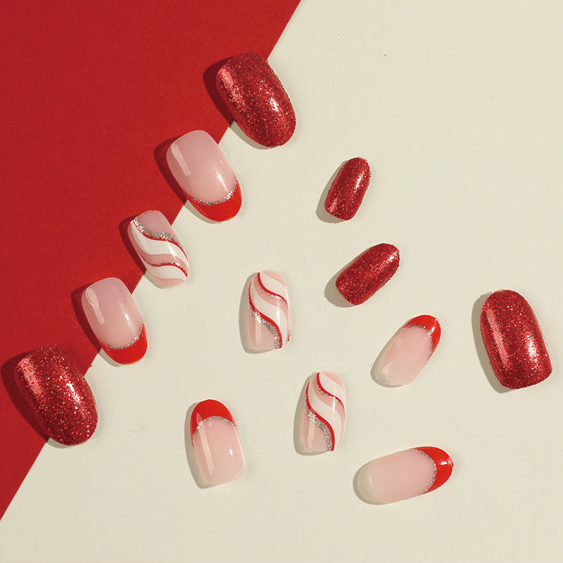Artful Nail Extensions with Glitter and Wave Pattern Stornfield