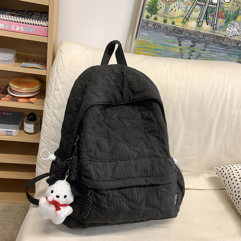 Quilted Backpack with Decorative Charm Stornfield