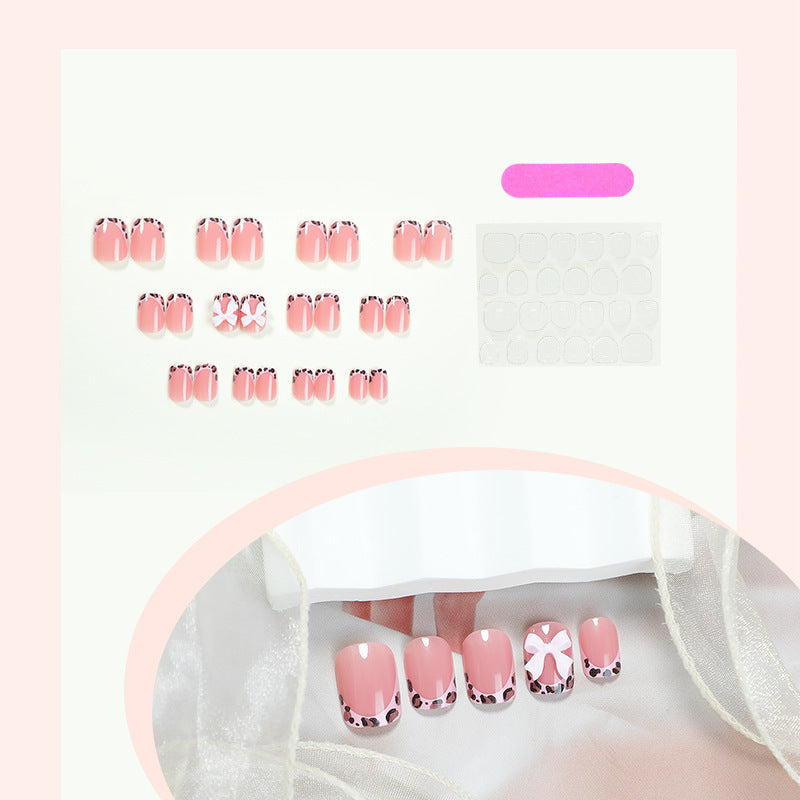 Artificial nail set with delicate bow and leopard patterns Stornfield