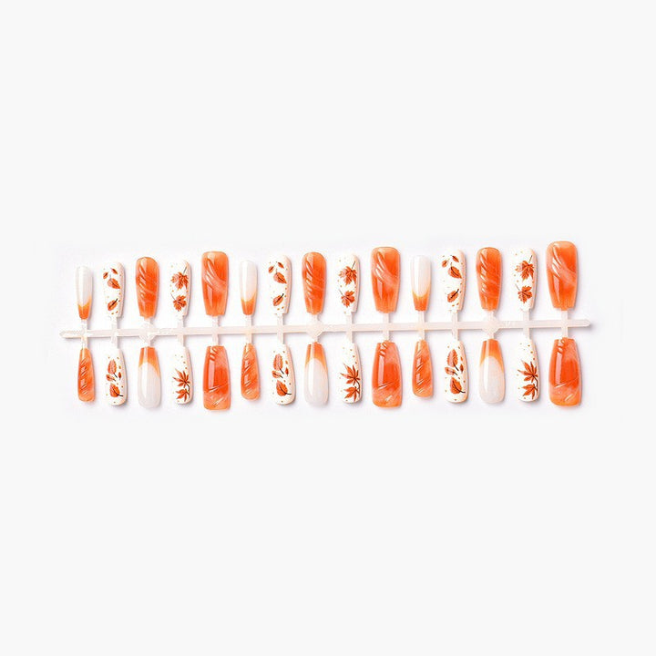 Acrylic nail set with elegant autumn motifs and shiny accents Stornfield