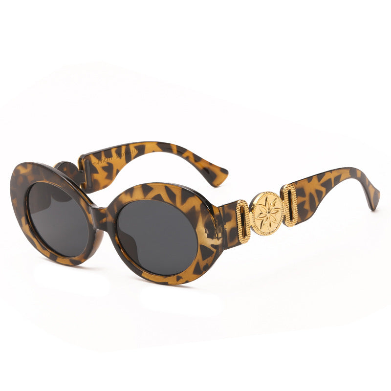 Ladies fashionable sunglasses with striking golden accents Stornfield