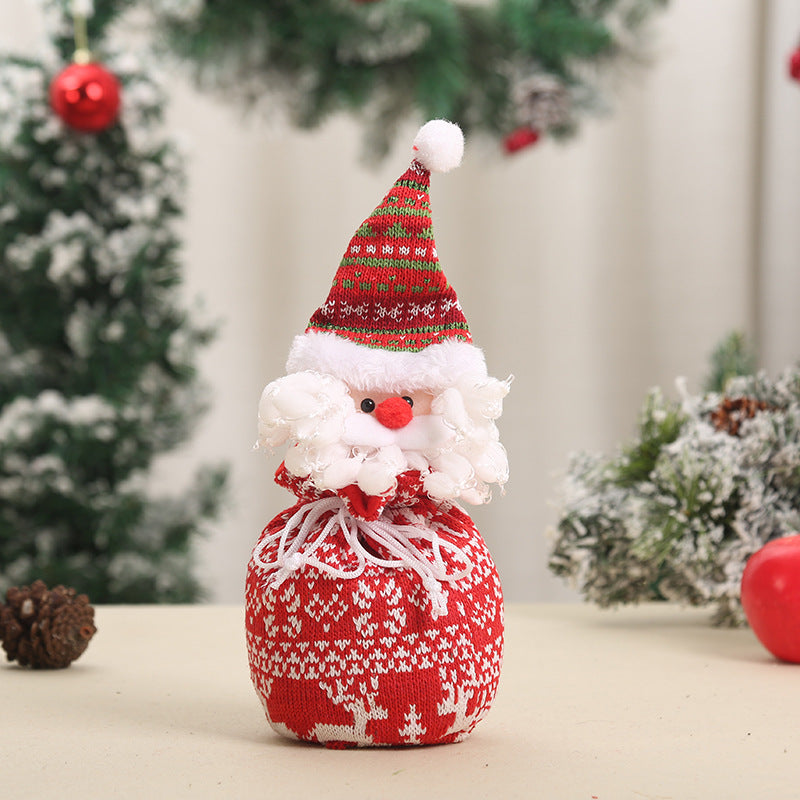 Cute Christmas gnome with gift sack Stornfield