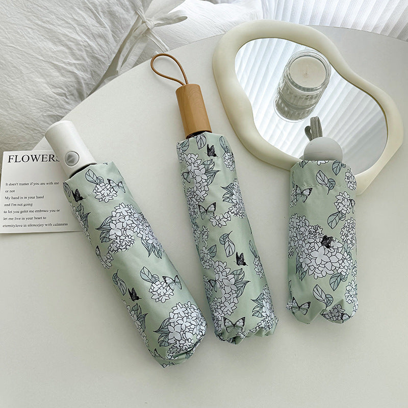 Women's Folding Umbrella with Innovative Floral Design Stornfield