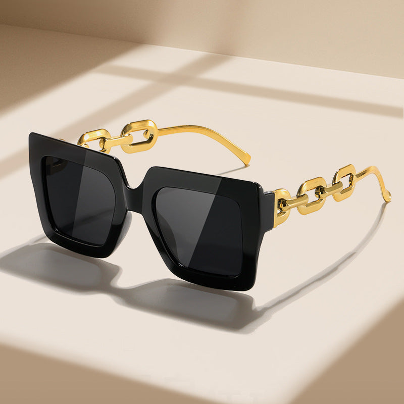 Women's fashionable sunglasses with unique rectangular frame and chain details Stornfield
