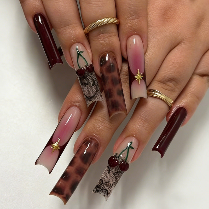 Artificial nail set with creative designs and glitter Stornfield