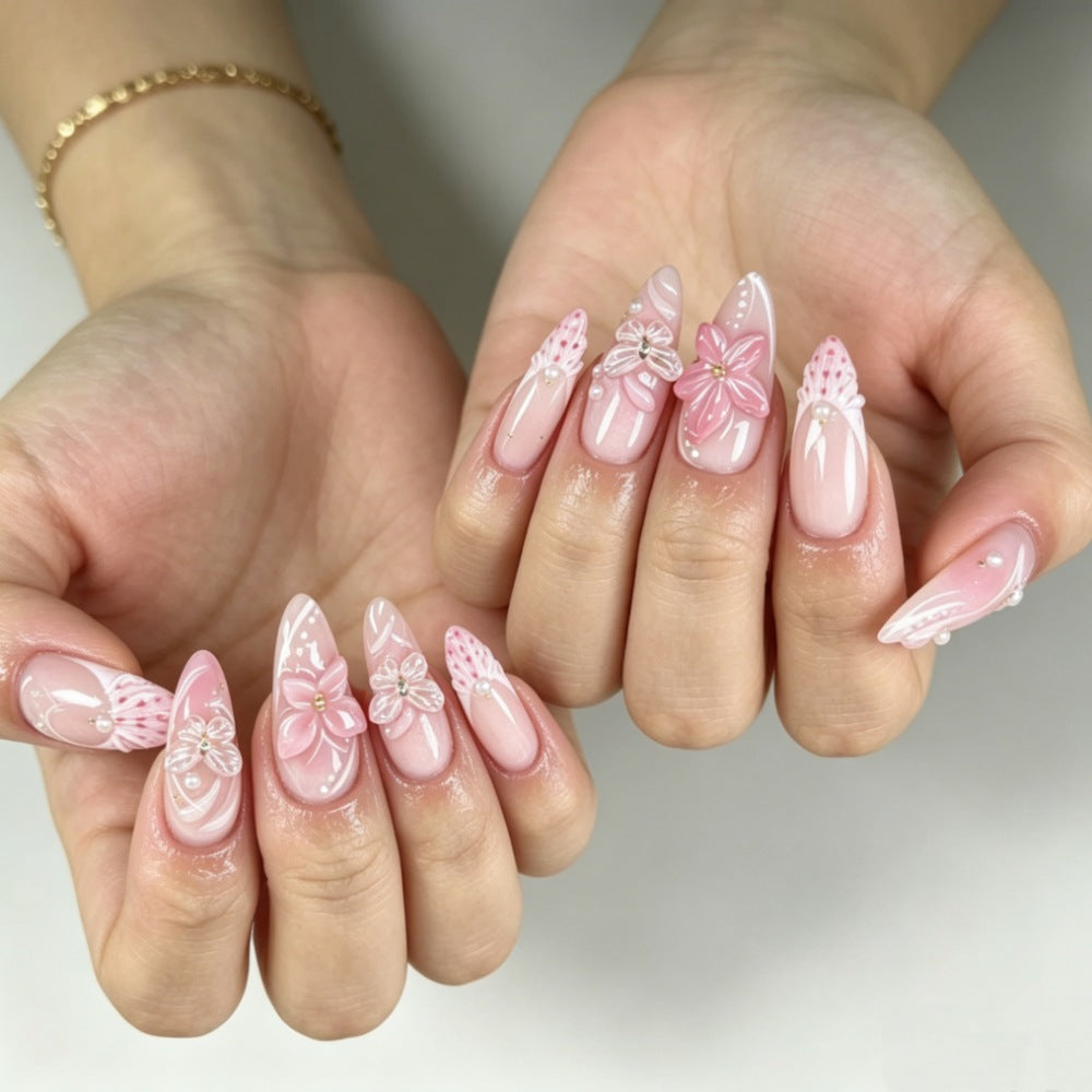 Artificial nails with romantic flower and butterfly accents Stornfield