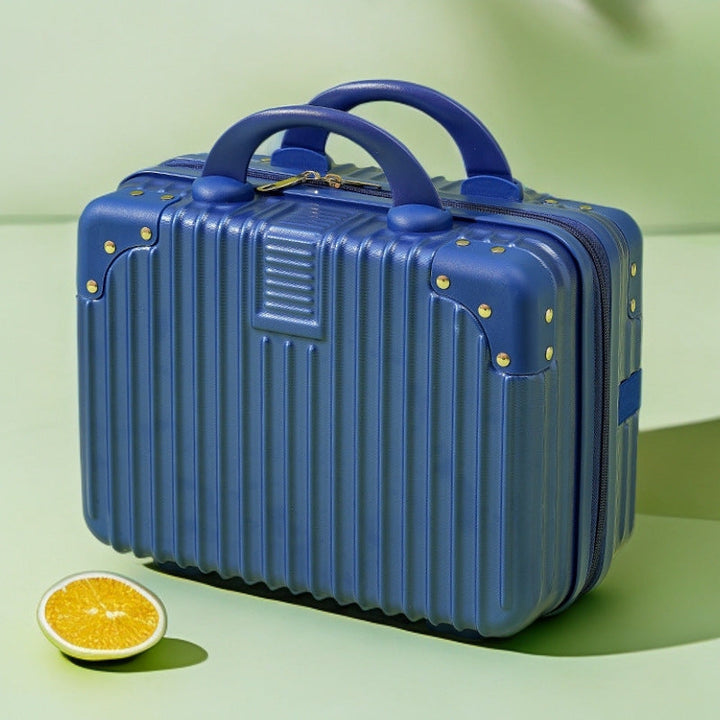 structured hard-shell vanity travel case with faux-leather corner reinforcements and dual top handles Stornfield