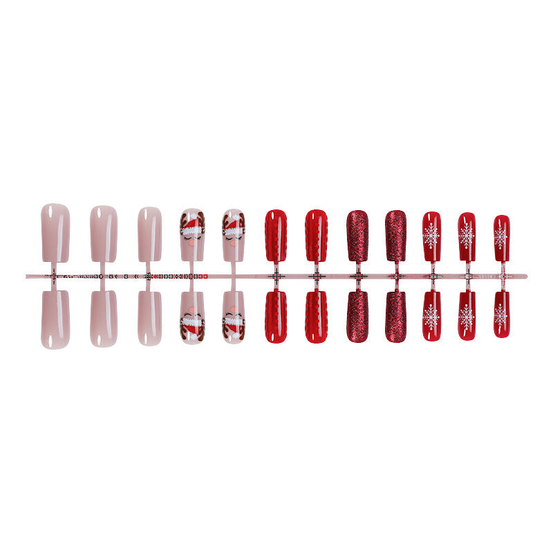 Artificial nail set with festive Christmas designs and glitter accents Stornfield