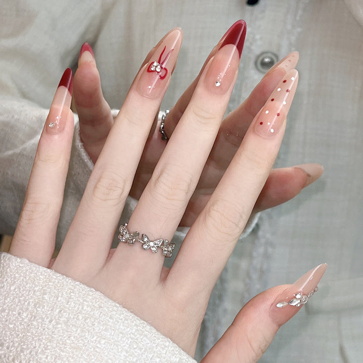 Artistic Press-On Nail Extensions with Decorative Patterns Stornfield