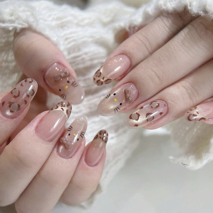 Creative Nail Art with Cute Cat Motif and Glitter Accents Stornfield