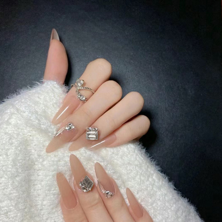 Glamorous and Elegant Artificial Nails with Crystal Accents Stornfield
