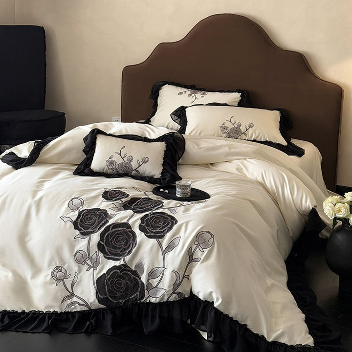 Luxurious bedding set with rose embroidery and ruffled hem
