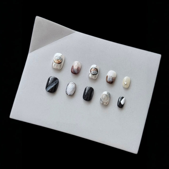 Artistic Press-On Nail Set with Elegant Designs