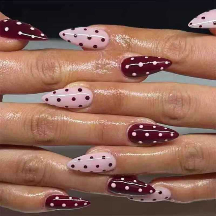 Artifical nail set with playful polka dot design and elegant accents Stornfield