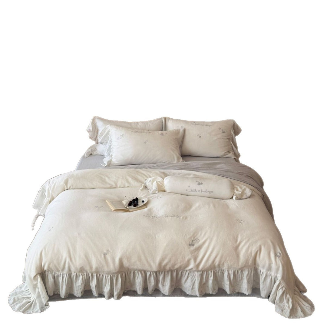 Romantic cotton bedding set with ruffles and delicate embroidery
