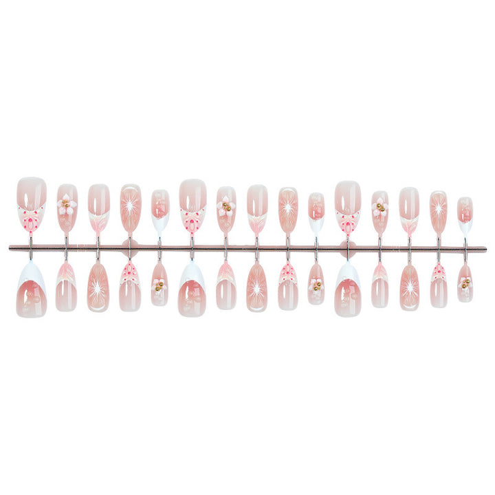 Art nail set with floral and elegant designs Stornfield