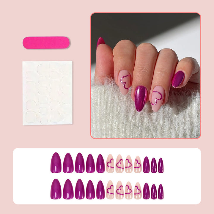 Artificial nail set with romantic heart design and glamorous accents Stornfield