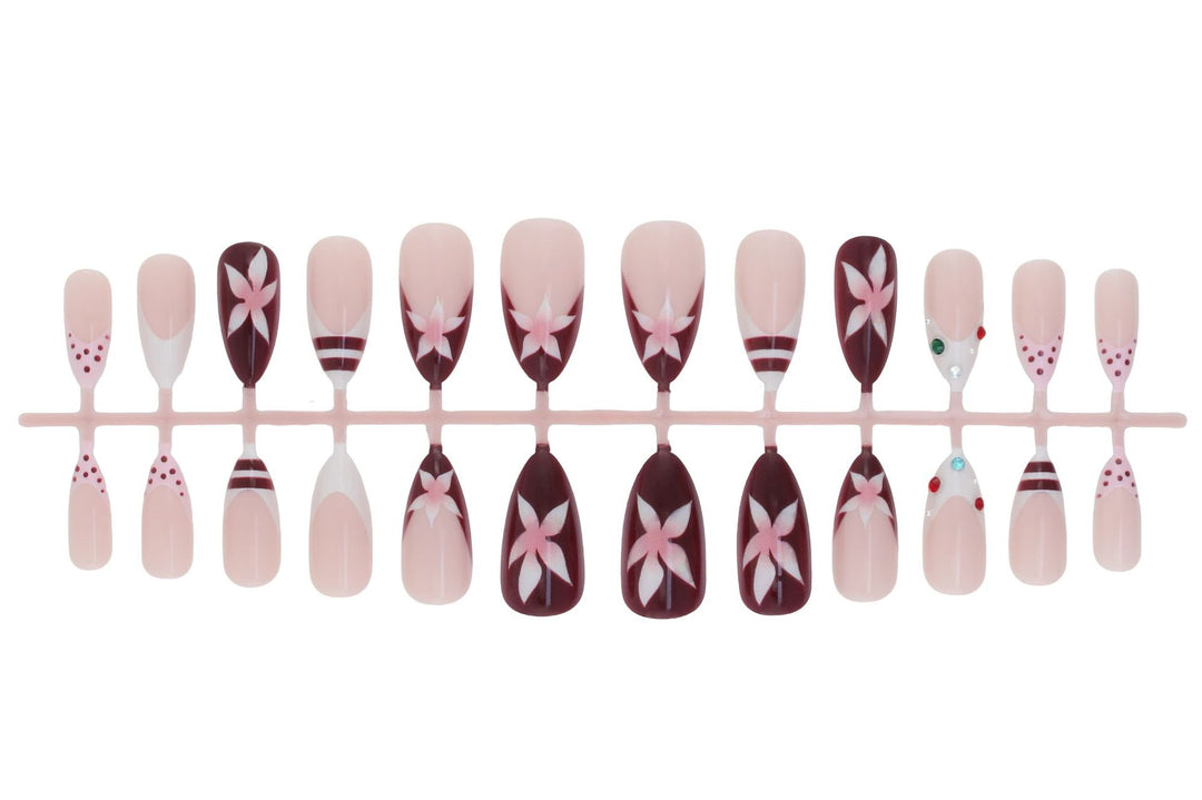 Artificial nail set with floral design and glitter accents Stornfield