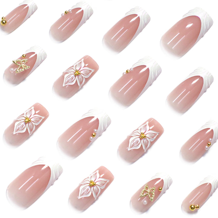Elegant artificial nails with floral design and gold accents Stornfield
