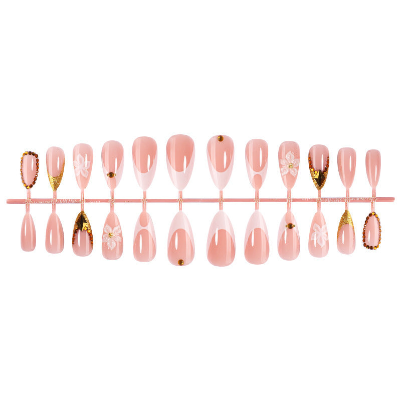 Artificial nail set with elegant flower and gold accents Stornfield