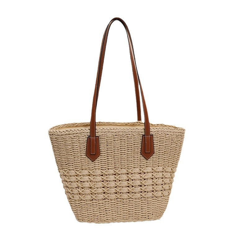 Handcrafted rattan basket bag with elegant leather accents Stornfield