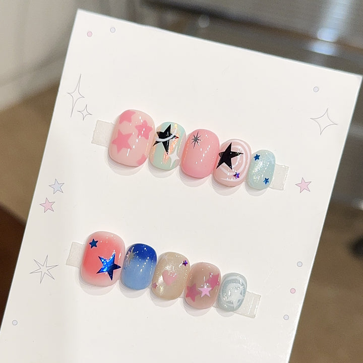 Artificial nails with glamorous star motifs Stornfield