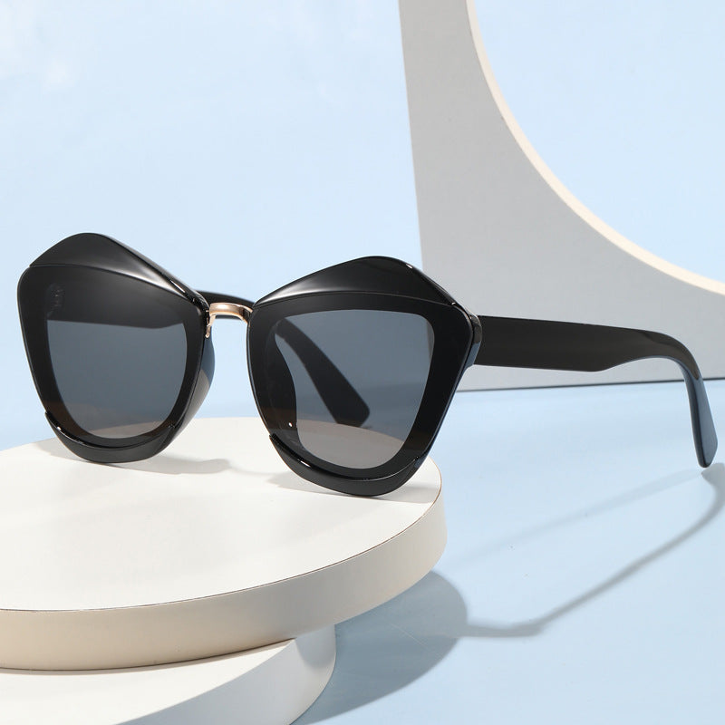 Women striking designer sunglasses with extravagant frame Stornfield