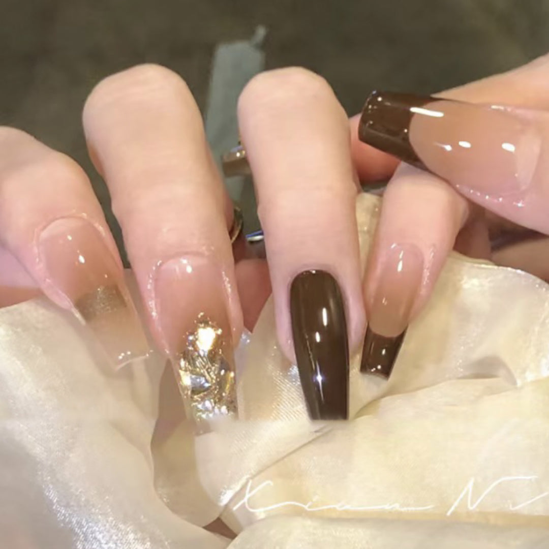 Elegant Long Press-On Nails with Decorative Gold Accents Stornfield