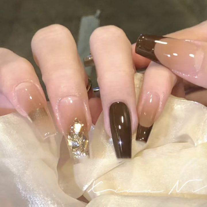 Elegant Long Press-On Nails with Decorative Gold Accents Stornfield
