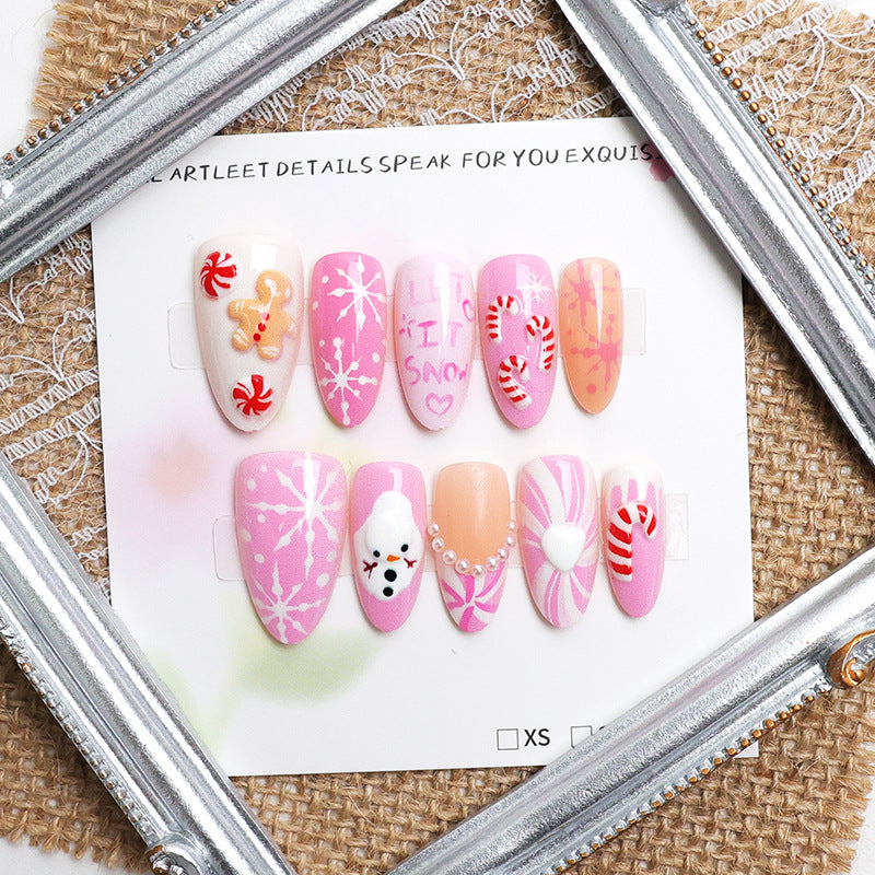 Acrylic nail set with festive Christmas designs and glamorous accents Stornfield