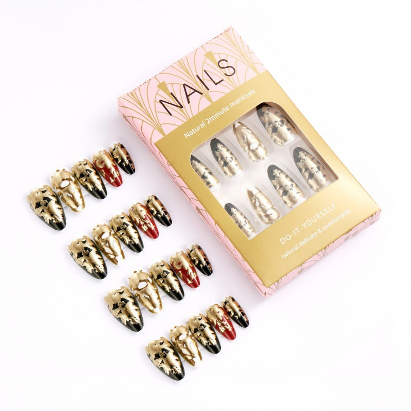 Elegant artificial nails with gold and black pattern Stornfield