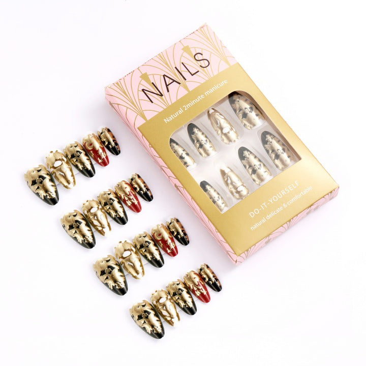 Elegant artificial nails with gold and black pattern Stornfield