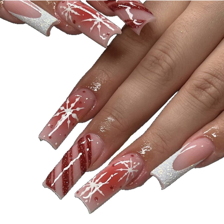 Acrylic nail set with festive candy cane and glitter accents Stornfield