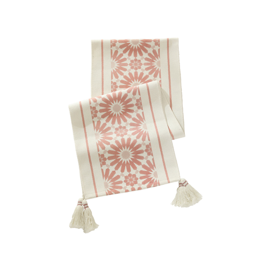 Web table runner made of cotton blend with woven diamond design and tassels
