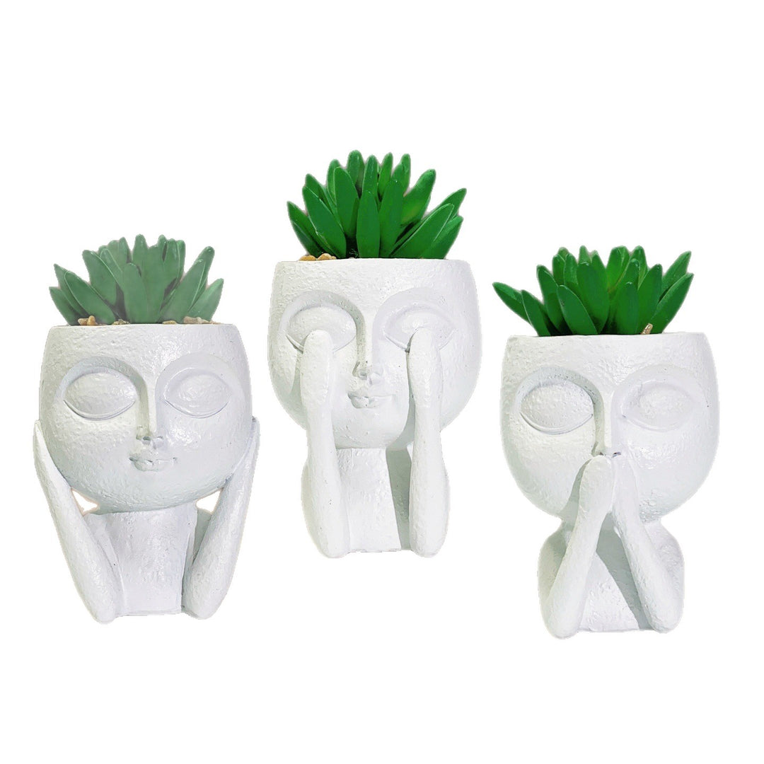 Plant pot with face motif Stornfield