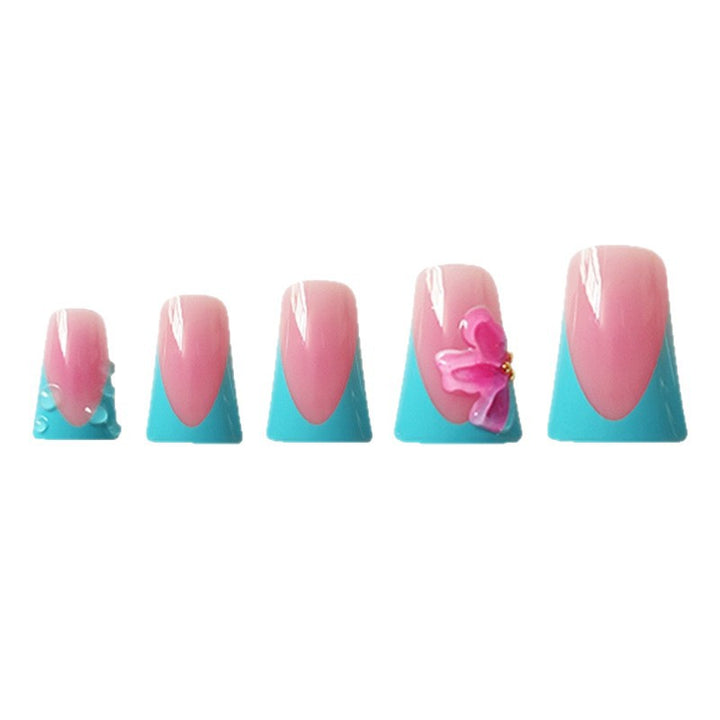 Artistic Press-On Nail Extensions with Floral Accents Stornfield