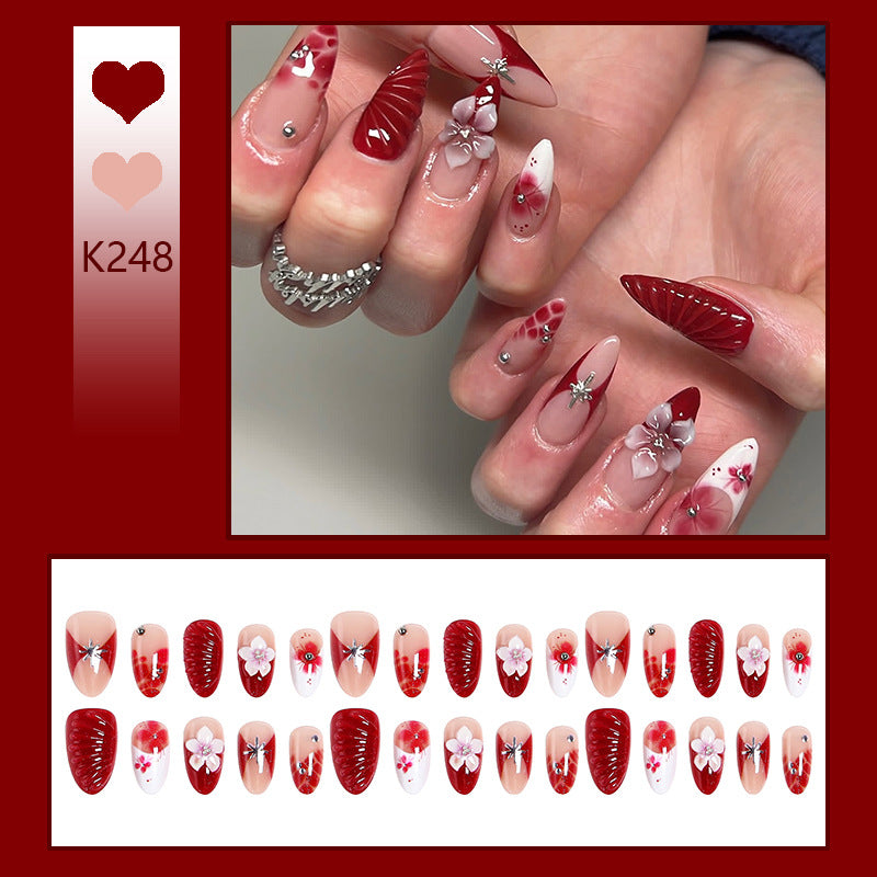 Luxury designed artificial nails with flower accents Stornfield