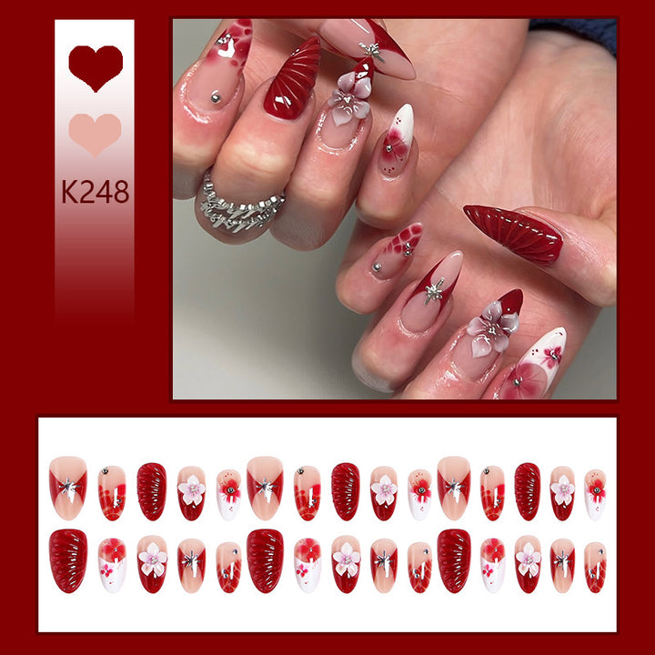 Luxury designed artificial nails with flower accents Stornfield