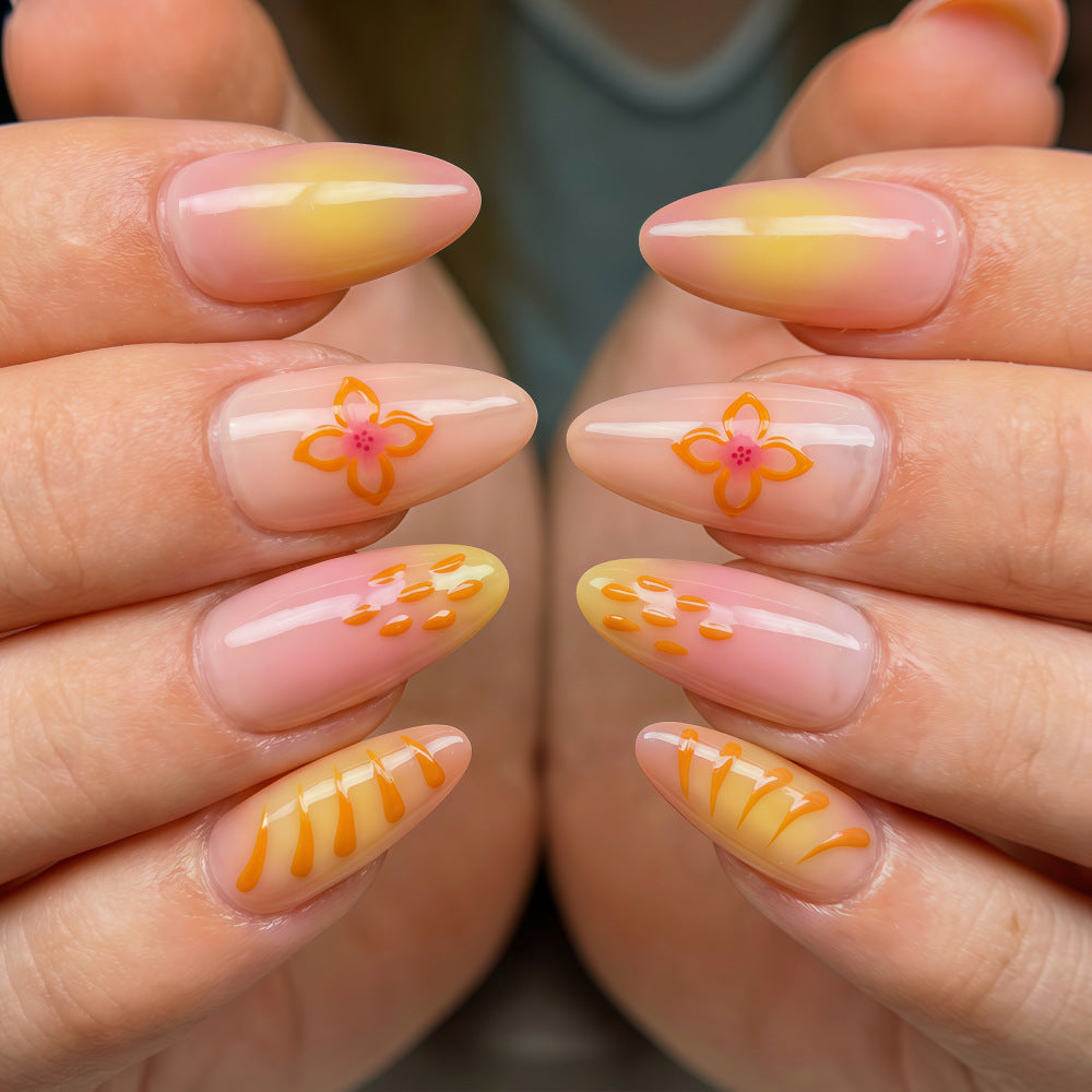 Artful Nail Tips with Floral Motifs Stornfield