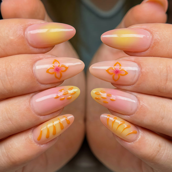 Artful Nail Tips with Floral Motifs Stornfield