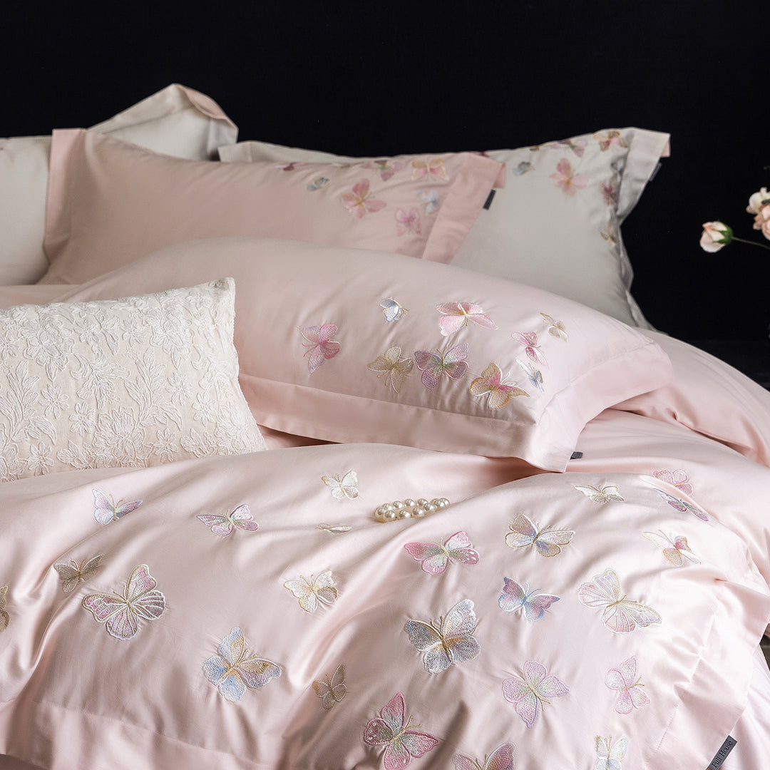 Premium bedding set made of extra soft cotton satin with delicate butterfly embroidery and concealed hotel closure