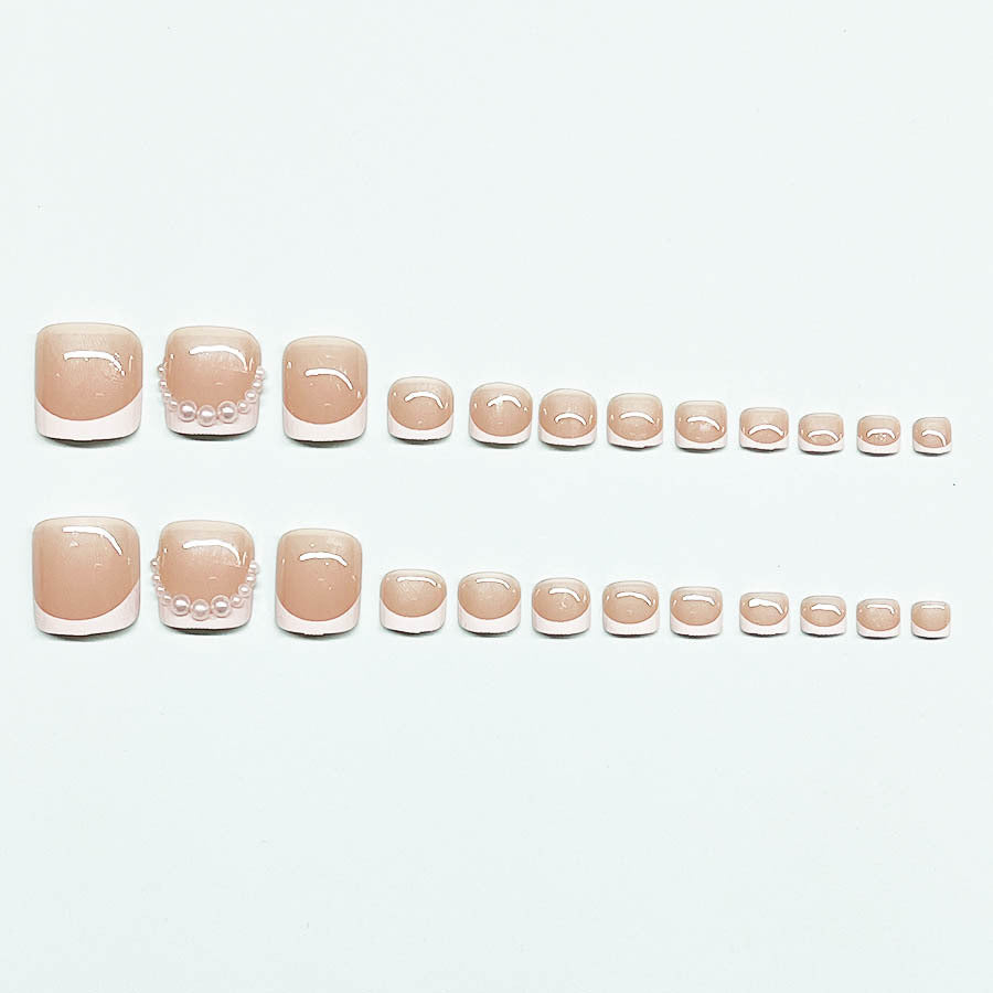 Artificial nail set for toenails with elegant tip decorations Stornfield