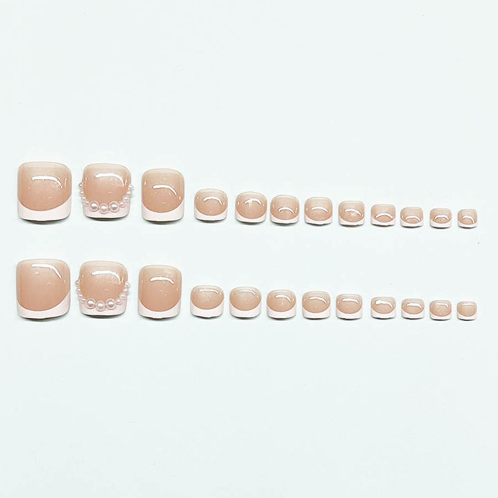 Artificial nail set for toenails with elegant tip decorations Stornfield