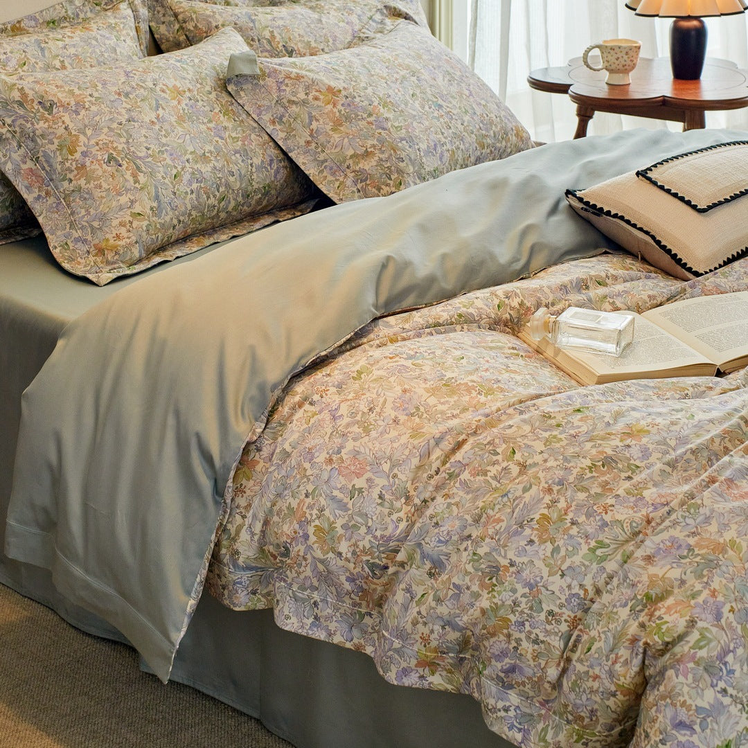 Luxurious cotton satin bed linen set with millefleurs floral pattern and fine piping